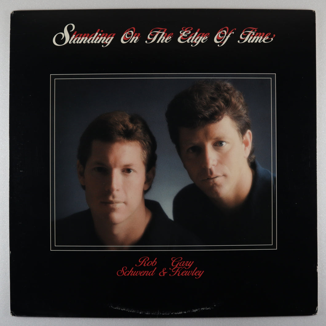 SCHWEND rob & GARY KEWLEY – Standing on the edge of time